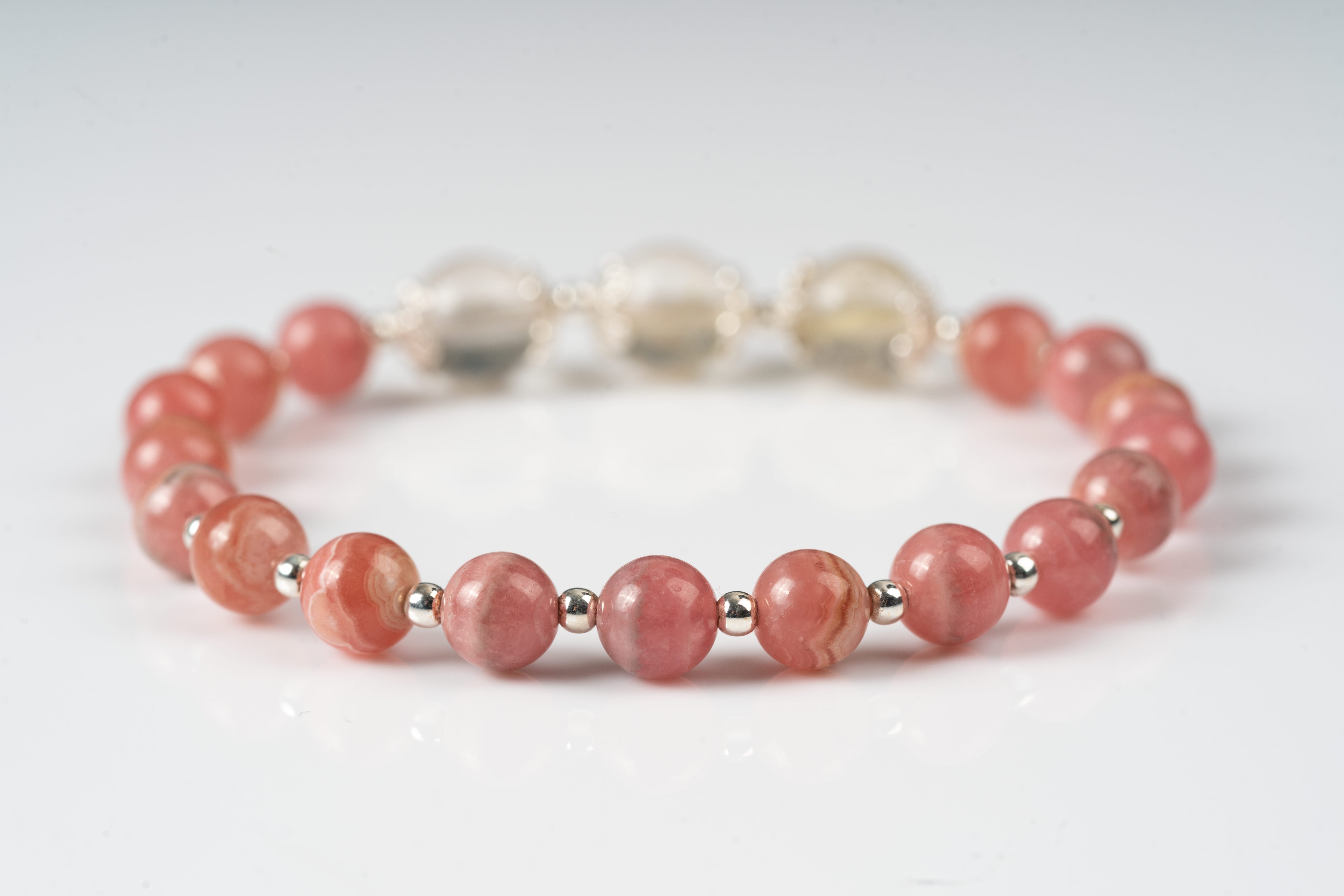 Rhodochrosite & rutiled quartz sterling silver bracelet