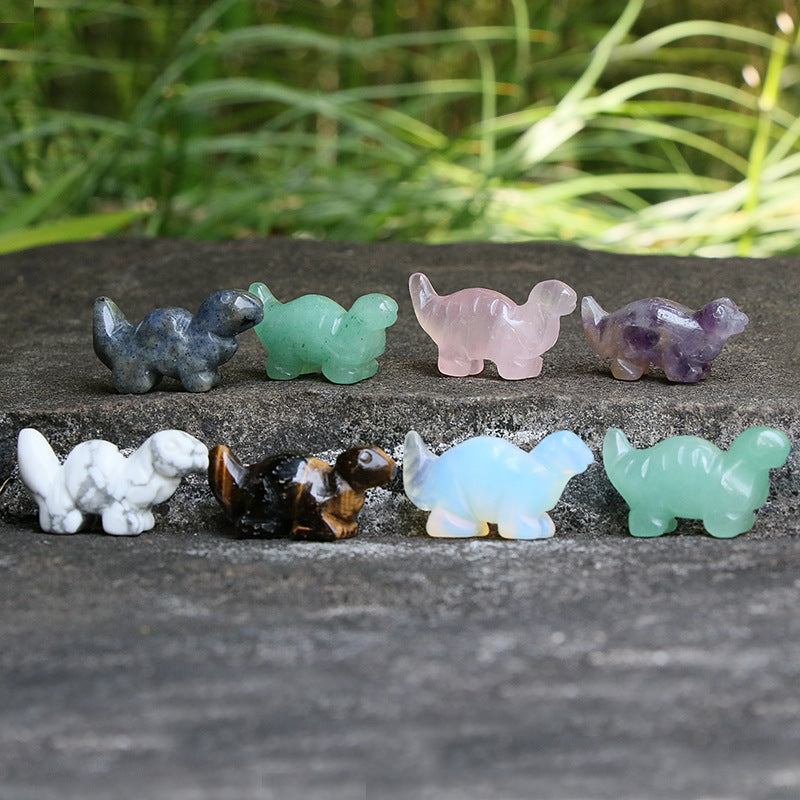 Natural crystal carving of small dinosaurs