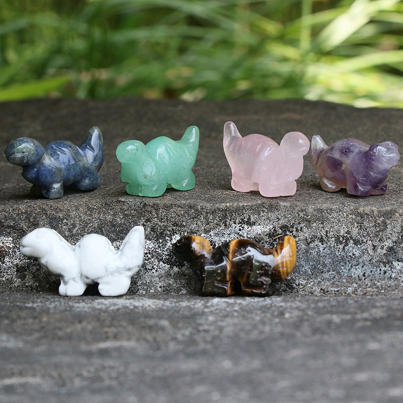 Natural crystal carving of small dinosaurs