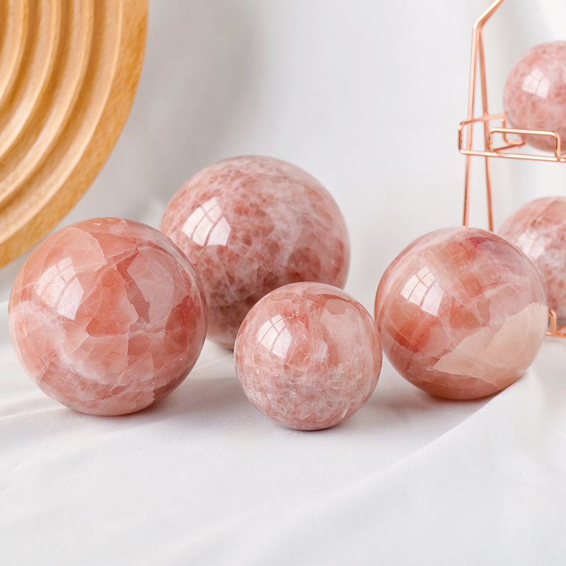 Red calcite crystal ball/sphere