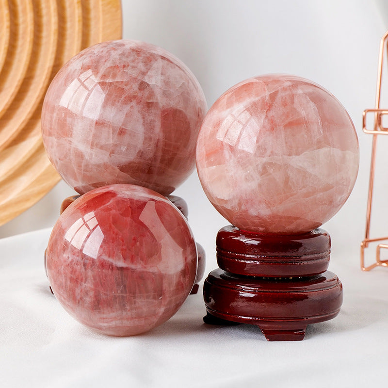 Red calcite crystal ball/sphere